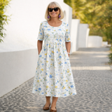 Robin | Cvjetna Midi Haljina" can be rewritten as "Robin | Floral Midi Dress.