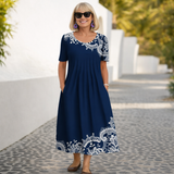 Robin | Cvjetna Midi Haljina" can be rewritten as "Robin | Floral Midi Dress.