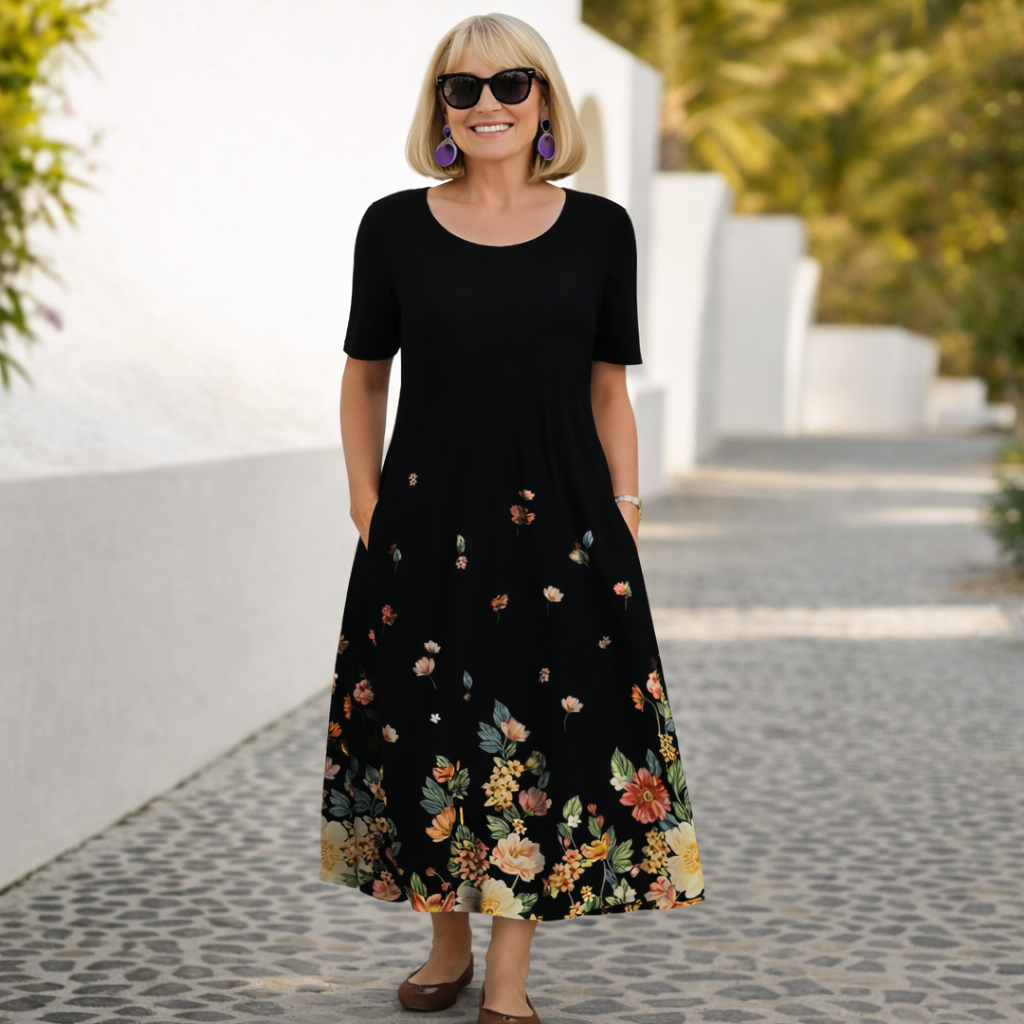 Robin | Cvjetna Midi Haljina" can be rewritten as "Robin | Floral Midi Dress.