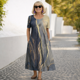 Robin | Cvjetna Midi Haljina" can be rewritten as "Robin | Floral Midi Dress.